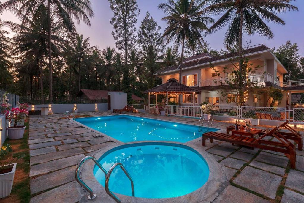 Kushalnagar Villa | Bask In The Greens by StayVista - 4BHK Pet-Friendly Villa with Home Theatre