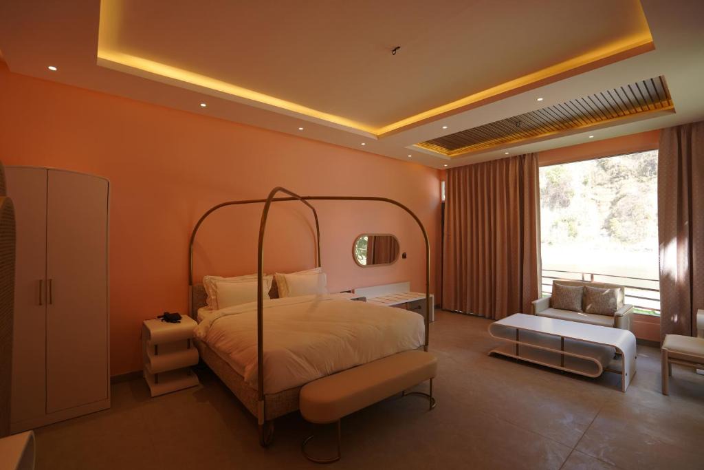 Garjia Resort | Bel-La Monde Riverside Jim Corbett - "A Unit of Luxe Opera Hotels & Resorts"