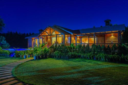 Dubbi Villa | ELIVAAS Signature Riveira Hills - 3 BHK Wooden Cottage with Lush Garden, Pvt Pool