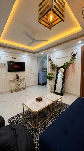 Sainik Farm Apartment | Golden Eclipse Luxury Stays