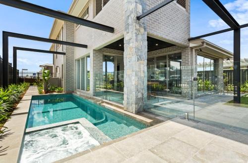 Marsden Park Villa | Luxury 4BR Retreat with Pool & Private Spa Bath