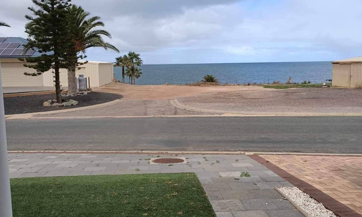 North Beach House | The happy place-Comfortable 3 bedroom home with sea views. Steps to the beach.