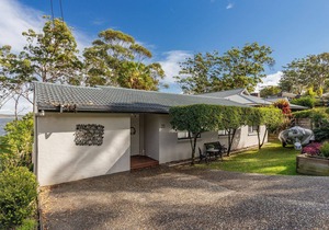 Ripples on Smiths Absolute waterfront property with stunning lake views. in Smiths Lake