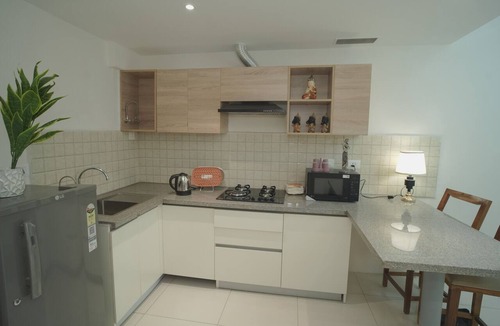 Jaypee Greens Apartment | 2-bedroom apartment in peaceful Greater Noida with AC and gym access