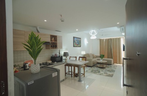 Jaypee Greens Apartment | 2-bedroom apartment in peaceful Greater Noida with AC and gym access