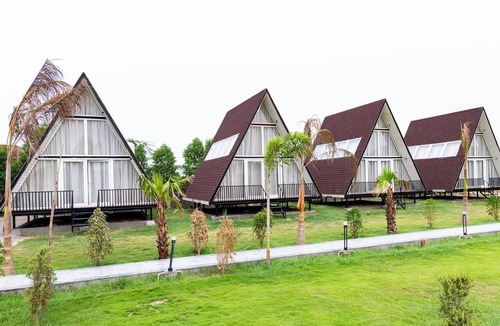 Faridabad Villa | Alaya Stays Malik Farms Wooden Cottages