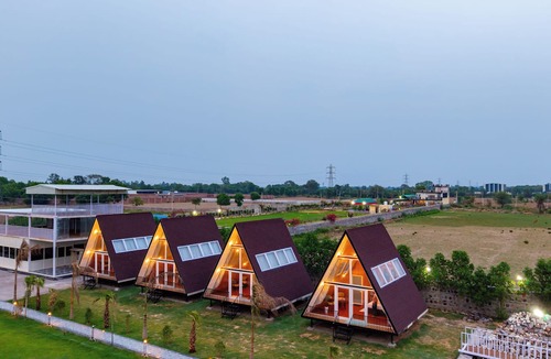 Faridabad Villa | Alaya Stays Malik Farms Wooden Cottages