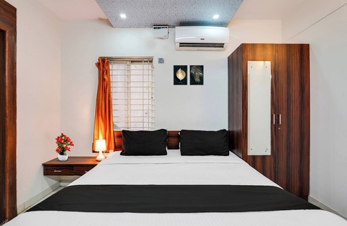 Domlur Hotel | Collection O Bangalore Airport Road
