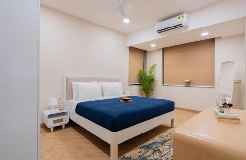 Saipem Apartment | ELIVAAS Signature 1 BHK with Jacuzzi & Lift - Kamerios Brisa