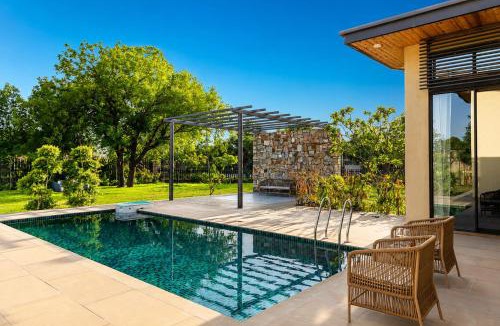 Jaipur Villa | ELIVAAS Signature El Bosque Spacious 4-BHK Villa With Private Pool, Garden & Open-air theater setup
