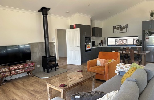 Upper Wakefield House | Ernie's Acre, sit back and relax in this calm, stylish space, pet friendly.