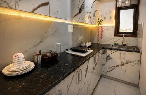 Sainik Farm Apartment | Golden Eclipse Luxury Stays