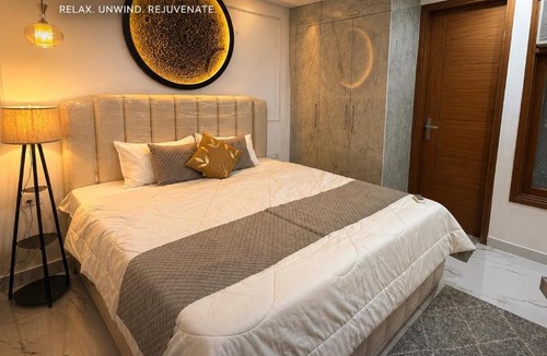 Sainik Farm Apartment | Golden Eclipse Luxury Stays