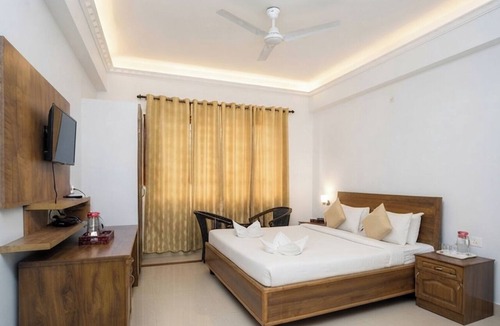 University of Kerala Senate House Campus Hotel | Hotel MAJESTIC INN PALAYAM