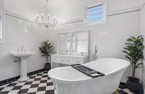 Burleigh Heads Apartment | Large Luxury studio, close to beach, newly renovated, deck, BBQ, carport