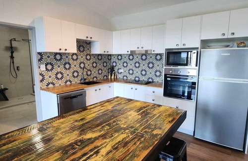 Miallo Cottage | NEW -The Sugar Shack, Ocean views over cane fields from your outdoor Spa Bath