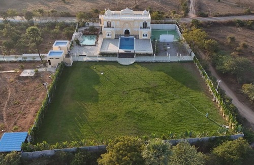 Ibrahimpatan Villa | Petal of Udaipur Palace - 9BR - Pool by Homeyhuts