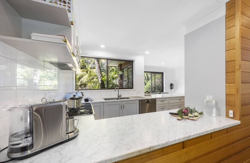 Rosebud House | Poolside Palms Oasis