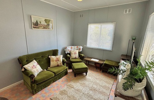South Evans Head House | Retro pet-friendly cottage near beach, river & RSL with air-con, comfortable interiors