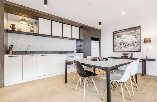 Abbotsford Condo | Riverside top-floor apartment with Yarra views