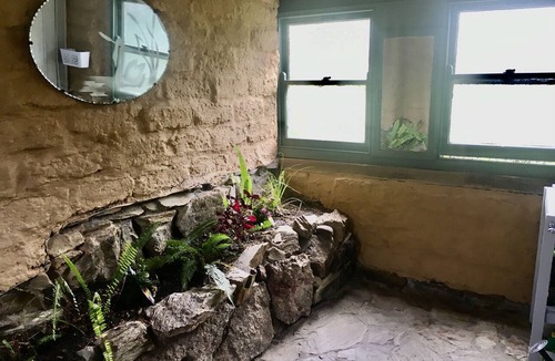Tanja Cottage | Rustic mudbrick cottage in a quiet bush setting, near Tathra. 2 beds, sleeps 4.