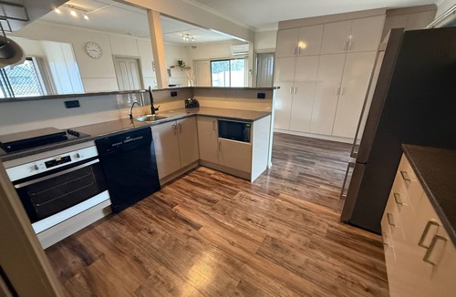 Dalrymple House | Shore Beats Work - Large entertaining area! Dog friendly!