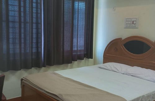 Theni Hotel | Sri Vasishta Homestays