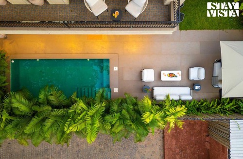 Guirim Villa | StayVista at Villa De Amara - Outdoor Pool & BBQ