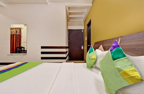 Nagavara Hotel | Treebo Premium Raj Elegance Manyata Tech Park