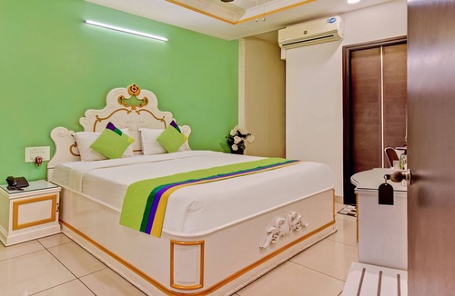Nagavara Hotel | Treebo Premium Raj Elegance Manyata Tech Park