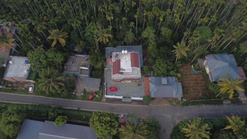 Sulthan Bathery House | Wayanadan Huts Homestay