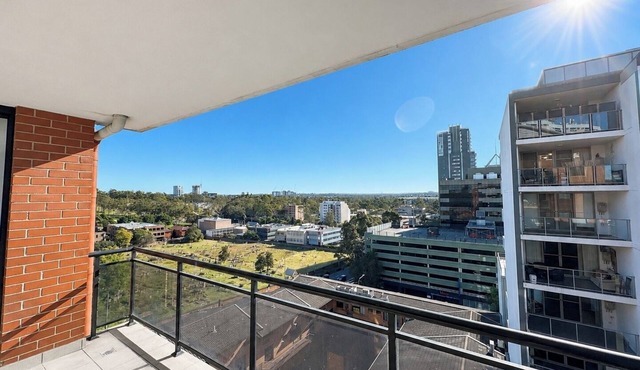 7 Min to Train: Central Parramatta 2BR + Parking in Parramatta