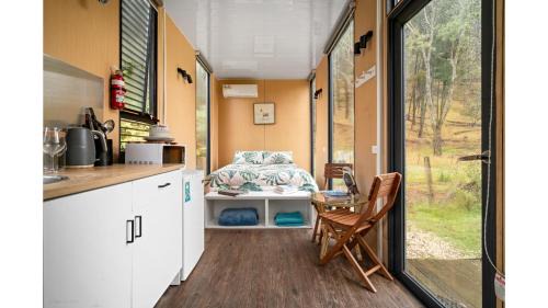 Alpaca Tiny House with Vineyard Lakeside by Tiny Away in Flowerdale