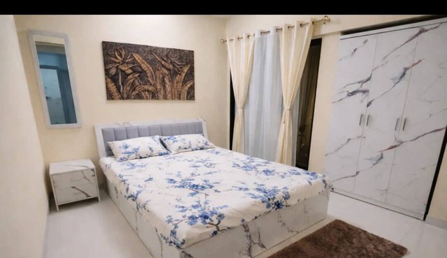 Bright balcony 2-bedroom apartment with AC in vibrant Thane/Mulund in Thane
