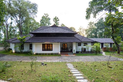 ELIVAAS Signature Tales By Tamarind 200 Year-Old 3 BHK Forest Villa with Pvt Pool, Garden, Gazebo, Backyard & Open-Air Shower Courtyard
