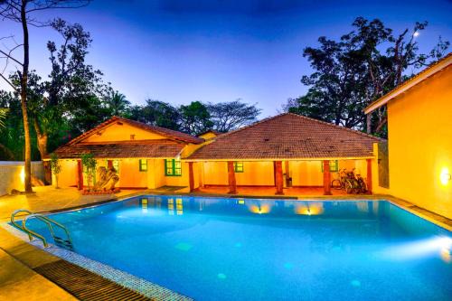 ELIVAAS Signature Terra Rosa Portuguese-styled 4-BHK Villa With Private Pool, Garden, Veranda & Sit-out Area in Maem