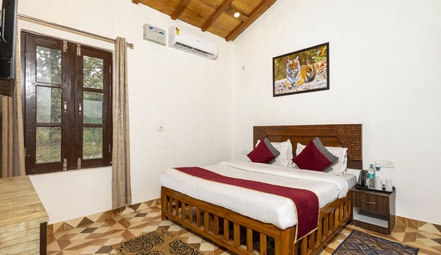 Goroomgo Mid Forest House Kalaguri