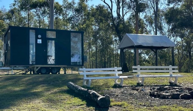 Lovely Tiny House Surrounded by Beautiful Rustic Landscape in Queensland, Australia in Lagoon Pocket