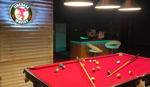 Man Cave with a touch of Lux. and an open fire. in Mount Doran