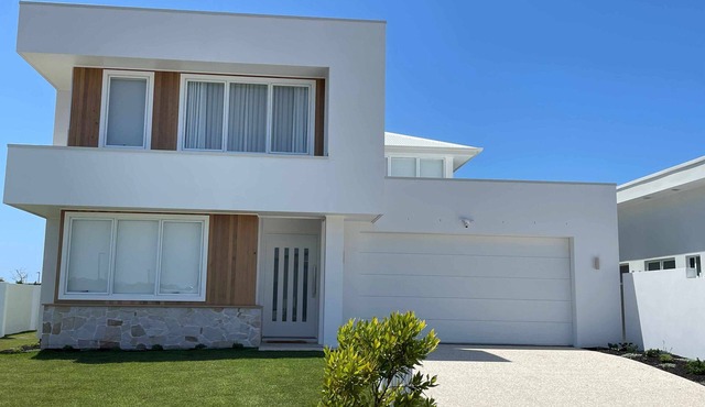 Modern Boho Retreat with Pool, Yard & Beaches Just Minutes Away in Pelican Waters