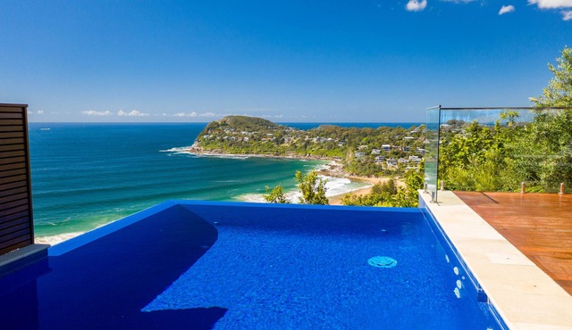 Rockstar! Jaw dropping beach view, poolside beauty, ultimate spacious livability in Palm Beach