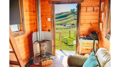 Saddle Country Escape by Tiny Away in Broadford