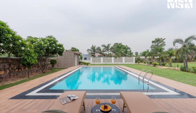 StayVista at Sunrise Manor with Pool and Lawn
