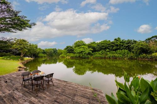 StayVista's Water Song Garden - Lake-Side, Pet-Friendly Villa with Bar, Spacious Lawn & Indoor-Outdoor Games