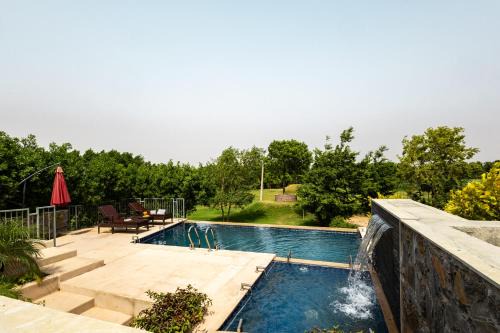 Stone Age home 4-BHK Stone-Clad Villa with Private Pool, Terrace Garden & Gazebo