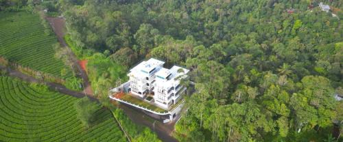 Sunrise Munnar by Maat Hotels