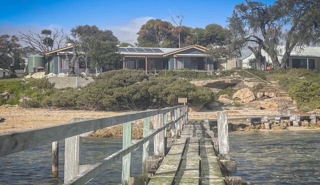 Sunset Ridge has direct access to a private beach and small jetty. in COFFIN BAY
