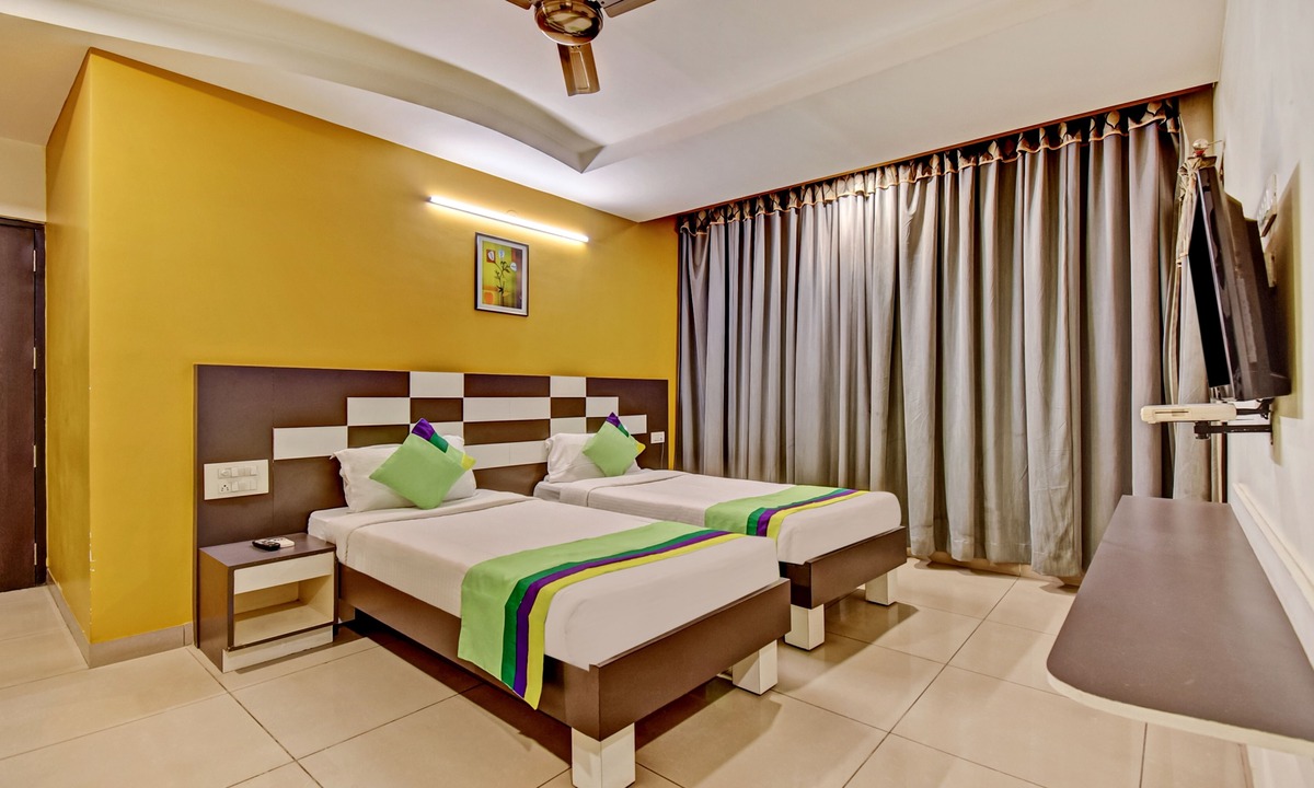Nagavara Hotel | Treebo Premium Raj Elegance Manyata Tech Park