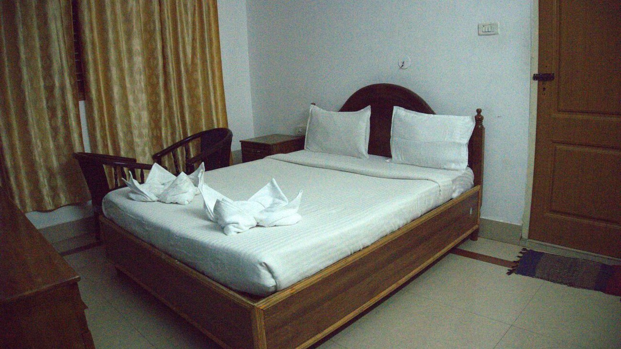 Photo of Bedroom in University of Kerala Senate House Campus