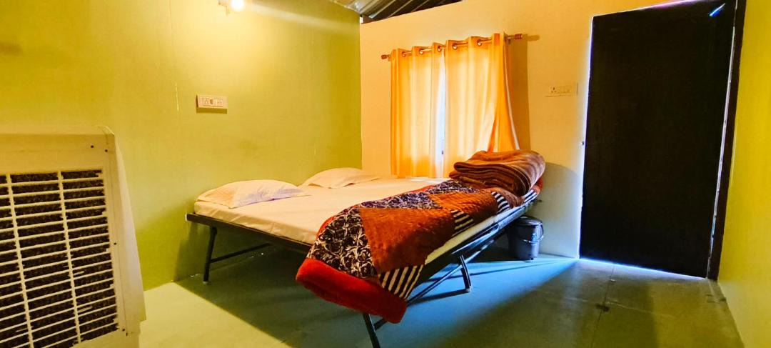 Photo of Bedroom in Dhunar Gaon